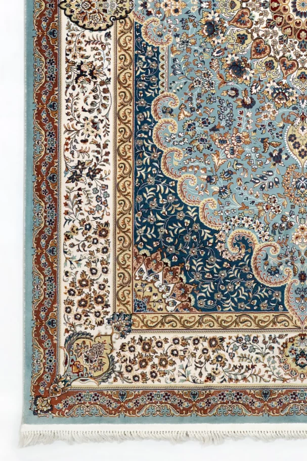 A close-up of a Qaleen Carpets rug with intricate patterns and colors, showcasing the company's high-quality and unique