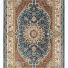 A stunning Qaleen Carpets rug with intricate patterns and vibrant colors, perfect for adding a touch of elegance to any room