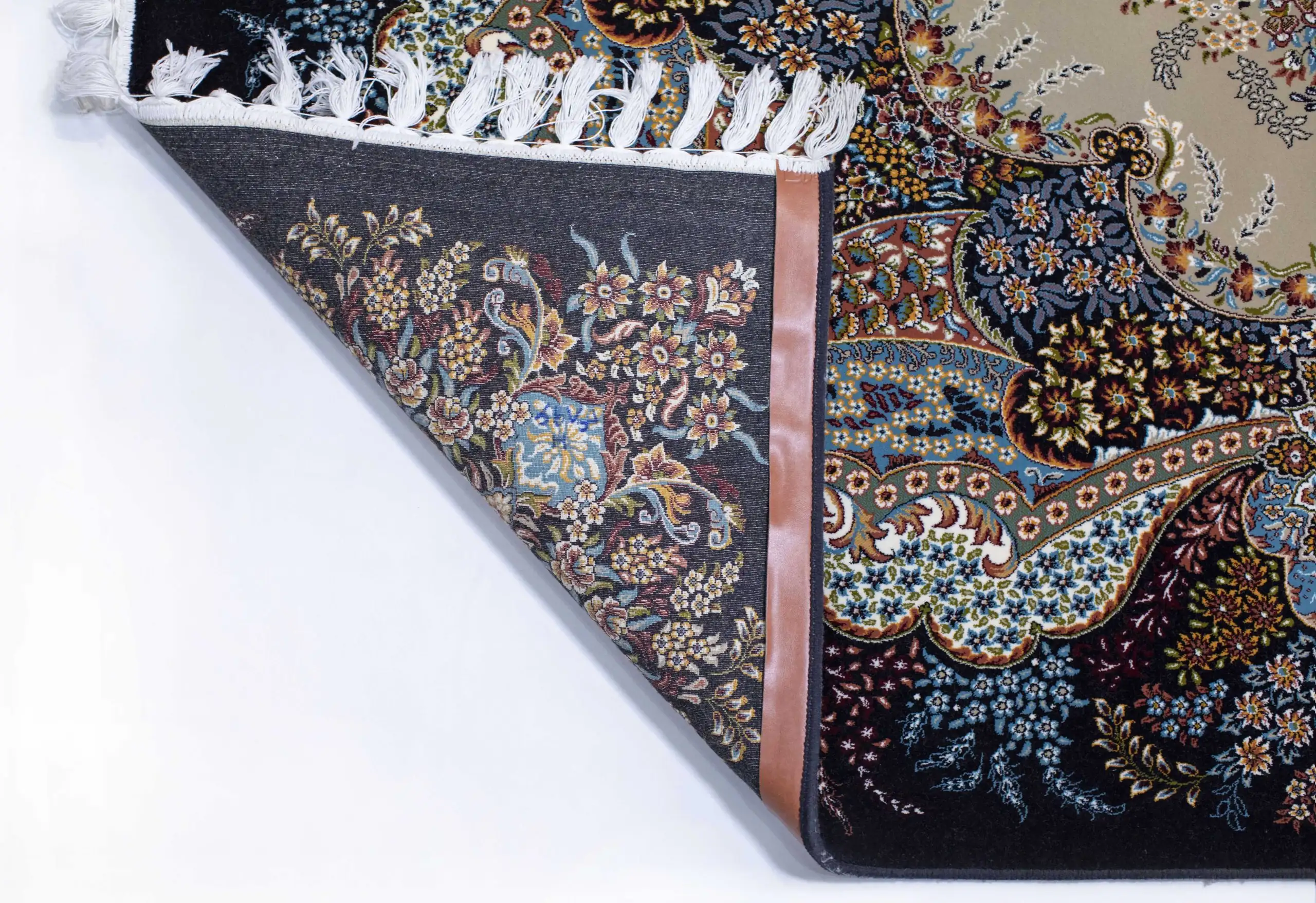 A close-up of a Qaleen Carpets rug's corner, showing its intricate design and pattern