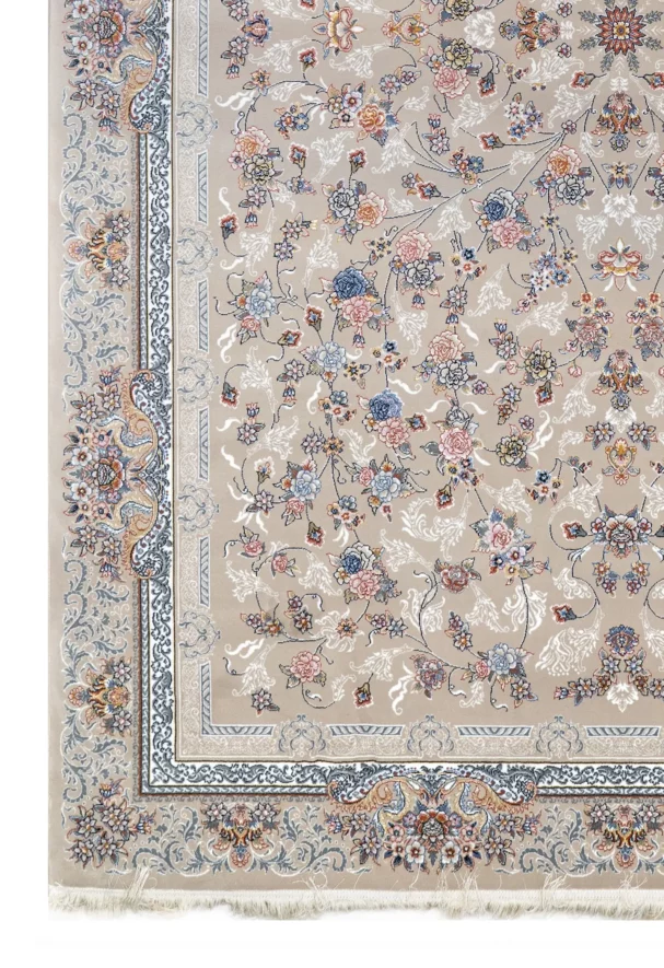 A close-up of a Qaleen Carpets rug with a floral pattern on a beige background, featuring a border with intricate designs