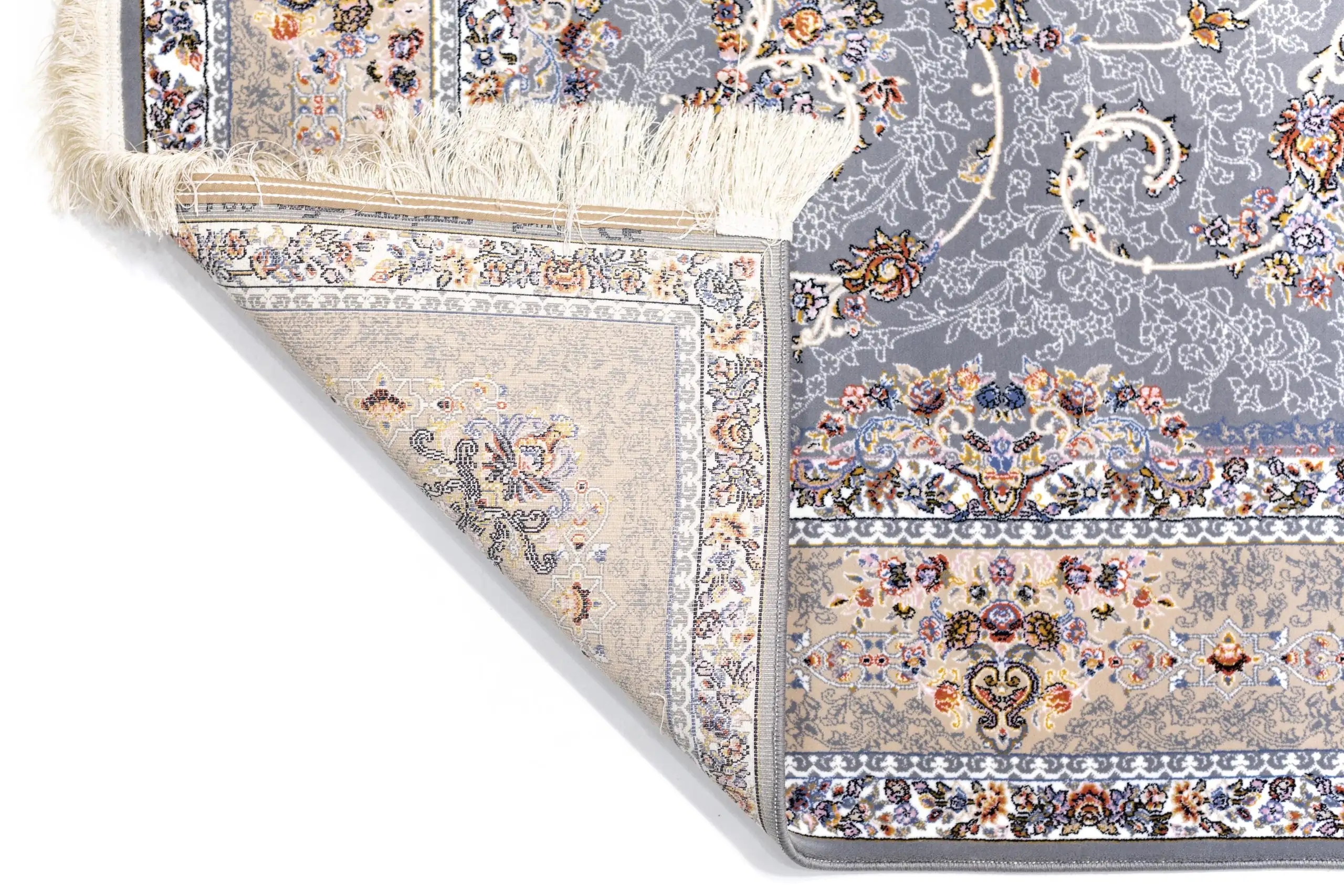 A close-up of a Qaleen Carpets rug, showcasing its intricate patterns and colors