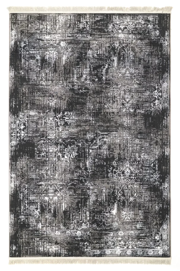A qaleen carpet with a black and white pattern, featuring a distressed design with a mix of dark and light colors, and a