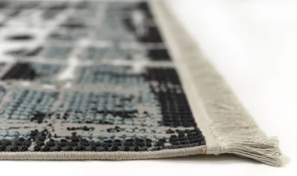 Carpets A close-up of a carpet's edge, with a focus on the intricate patterns and textures