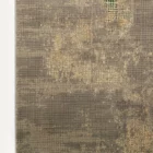 A close-up of a Qaleen Carpets rug, showcasing its intricate design and texture