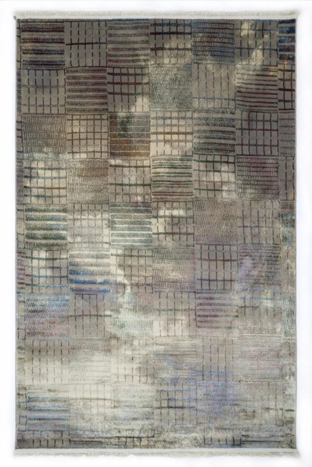 A stunning Qaleen Carpets rug with intricate patterns and colors, perfect for adding a touch of elegance to any room