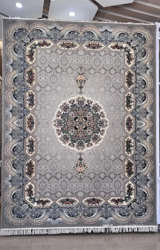 Carpets A large, intricately designed carpet with a central medallion and intricate patterns, showcasing the art of