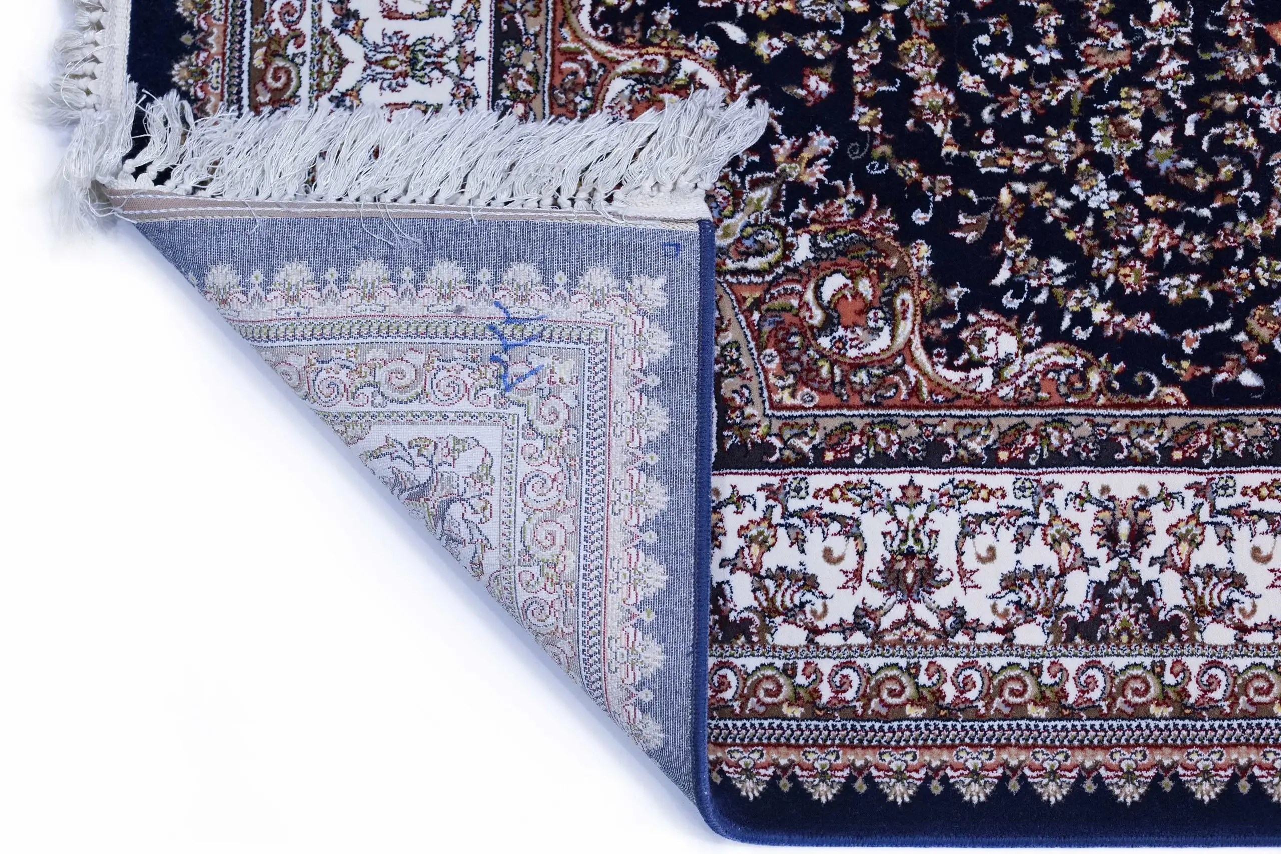 Carpets A close-up of a rug's corner, showcasing its intricate carpet design and delicate carpeting