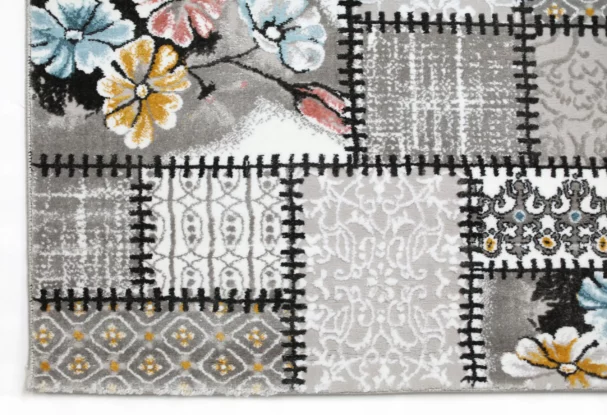 A beautiful, high-quality carpet with a unique, intricate design, featuring a mix of patterns and colors, perfect for adding