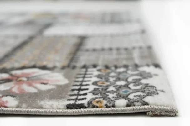 Carpets A close-up of a carpet's edge, with a focus on the intricate patterns and textures