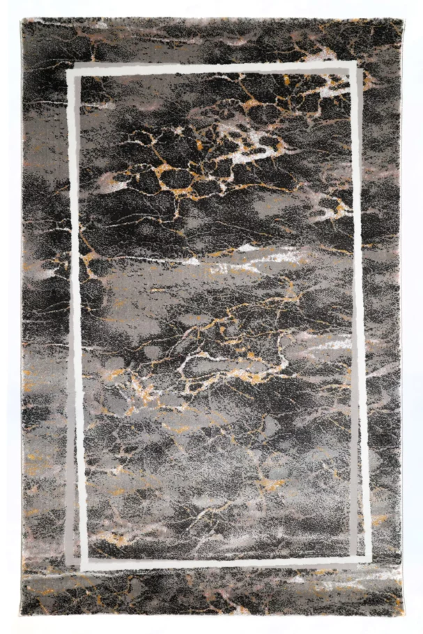 A stunning Qaleen Carpets rug with a dark, marbled design featuring gold and white veins on a black background, surrounded