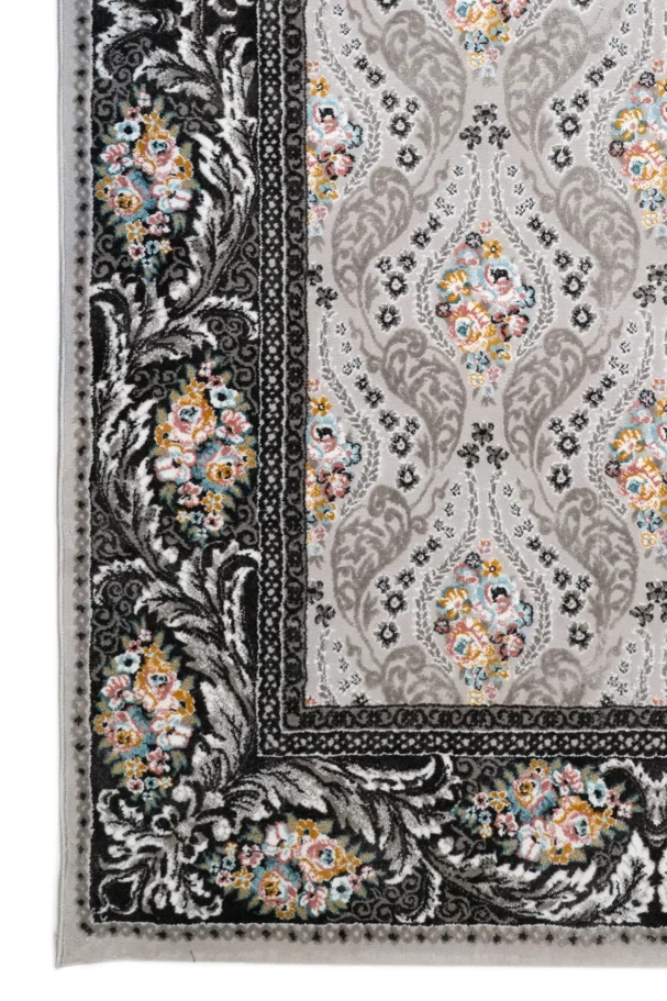 A beautiful, intricately designed carpet with a mix of patterns and colors, showcasing the art of carpets and rugs