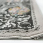 A close-up view of a Qaleen Carpets rug, showcasing its intricate design and soft, plush texture