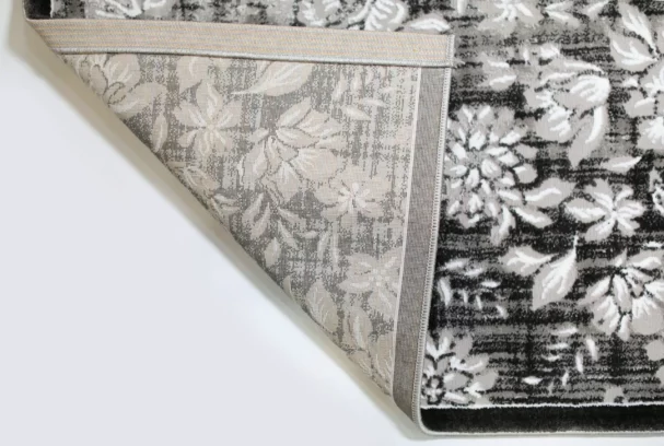 Carpets A high-quality image of a carpet with a floral pattern, showcasing its soft and durable design