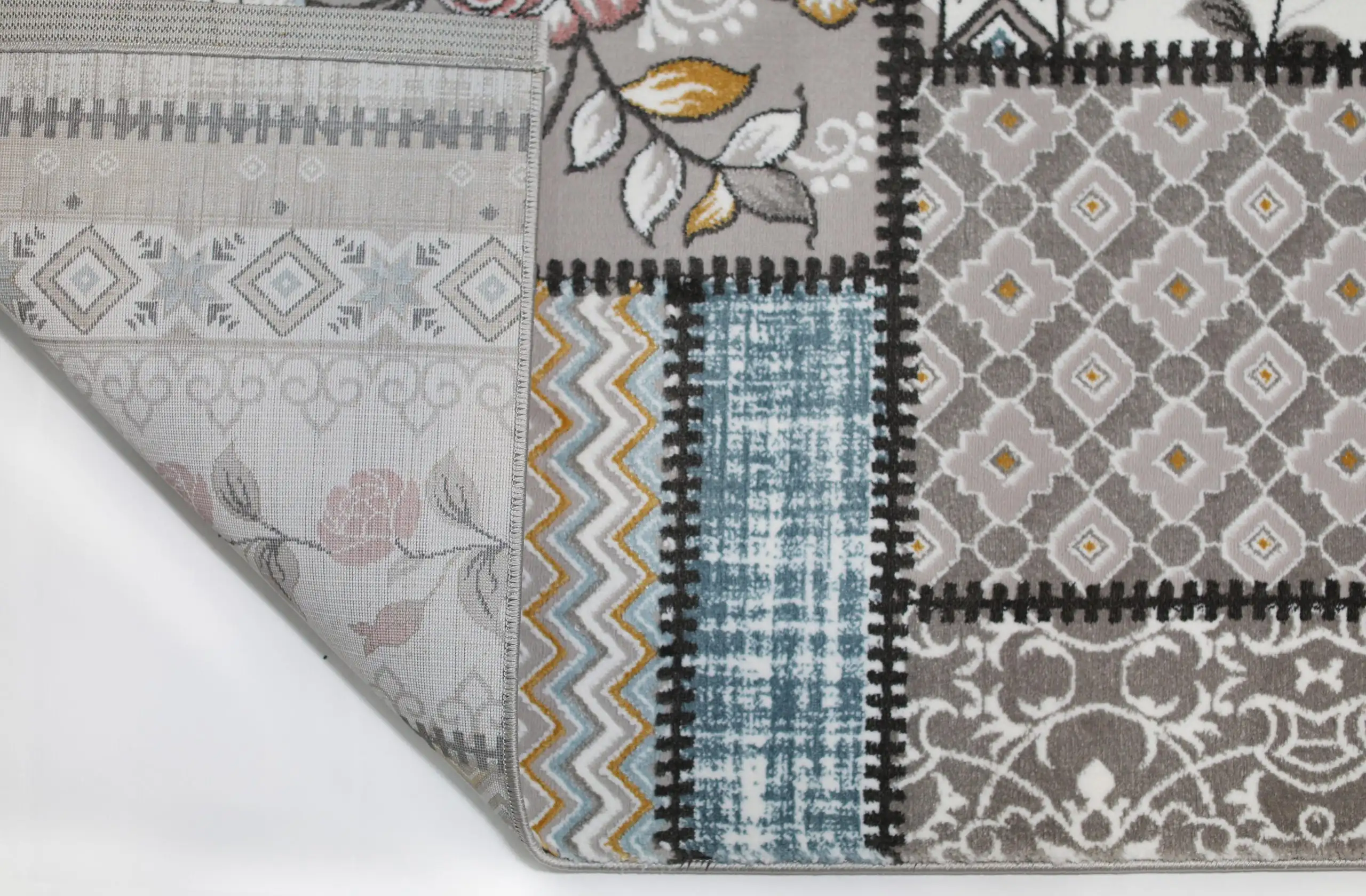 A selection of carpets and rugs with various patterns and designs, including carpets and rugs with a focus on carpets