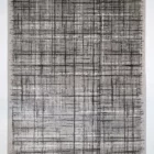 A high-quality, hand-knotted Qaleen Carpets rug with a traditional Persian design, featuring a rich, intricate pattern of