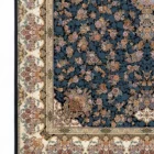 Carpets A beautiful, intricately designed carpet with a rich, dark blue background and a vibrant, floral pattern