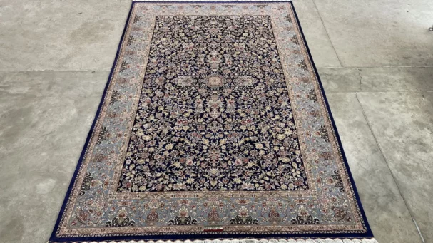 Carpets A beautiful, intricately designed carpet with a mix of blue, gold, and red colors