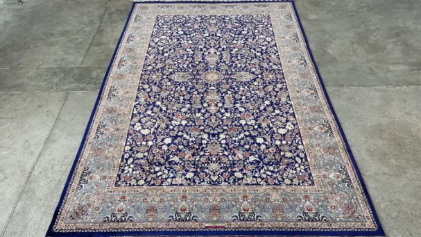 Carpets A beautiful, intricately designed carpet with a rich, vibrant pattern, perfect for adding a touch of elegance to any