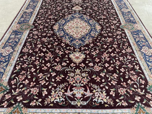 Carpets A beautiful, intricately designed carpet with a rich, dark background and a central, ornate pattern surrounded by a