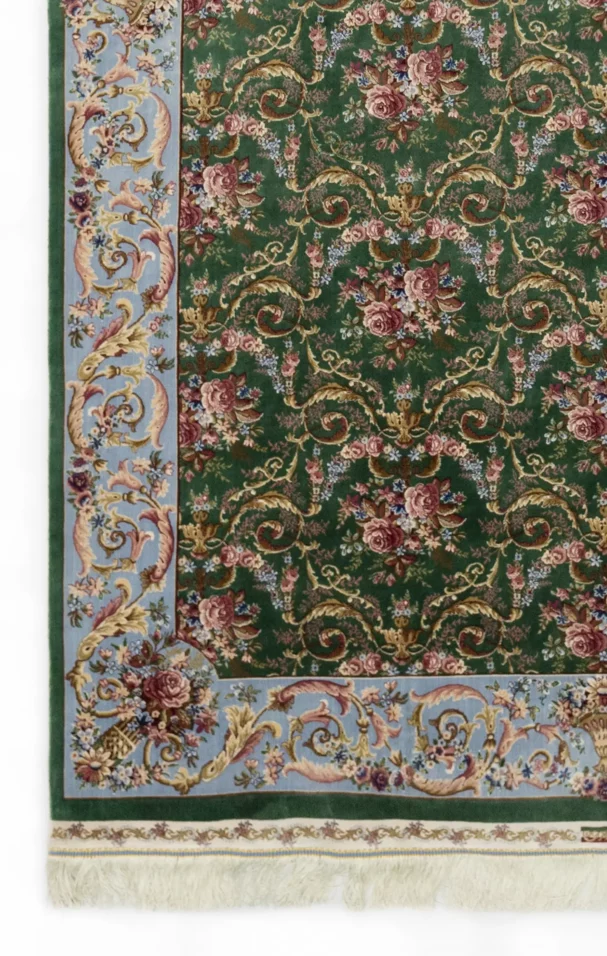 Carpets A beautiful, intricately designed carpet with a green background and intricate floral patterns