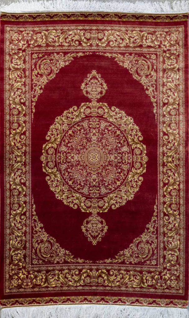 Carpets A beautiful, intricately designed carpet with a rich, red and gold color scheme, featuring a central medallion and