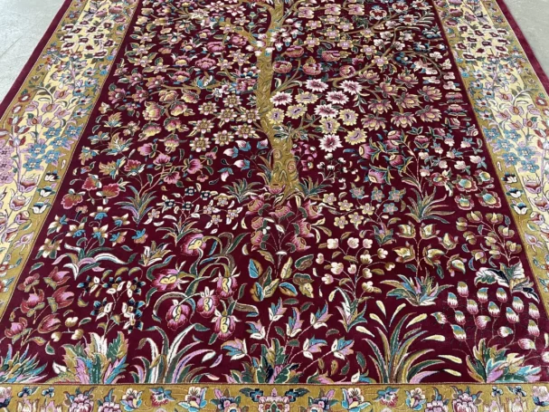 Carpets A beautiful, intricately designed carpet with a rich, deep red background and a golden border
