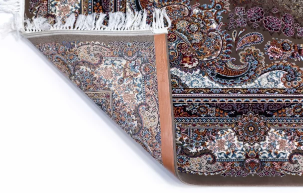 Carpets A beautiful, intricately designed carpet with a rich, vibrant pattern, showcasing the art of carpeting and rug design