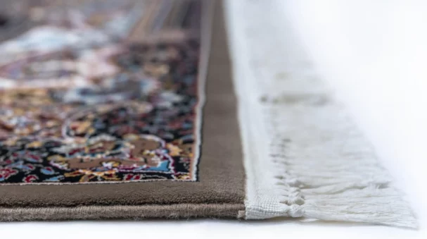 Carpets A close-up of a carpet's edge, with a focus on the intricate patterns and colors