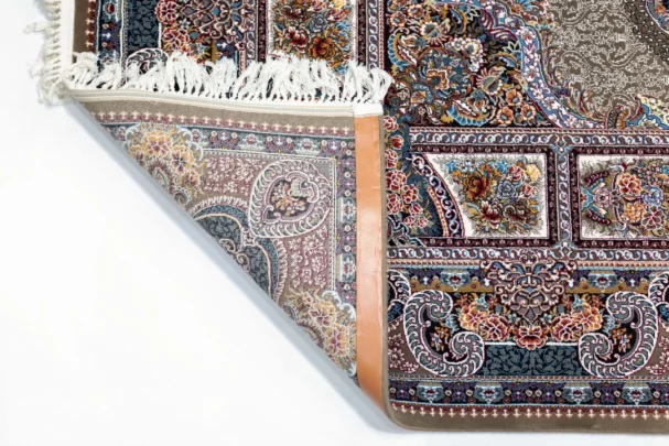 Carpets A close-up of a carpet's edge, with intricate patterns and colors