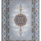 A beautiful, intricately designed carpet with a central medallion and intricate patterns, showcasing the art of carpeting