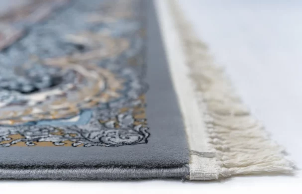 Carpets A close-up of a carpet's edge, with a focus on the intricate design and texture