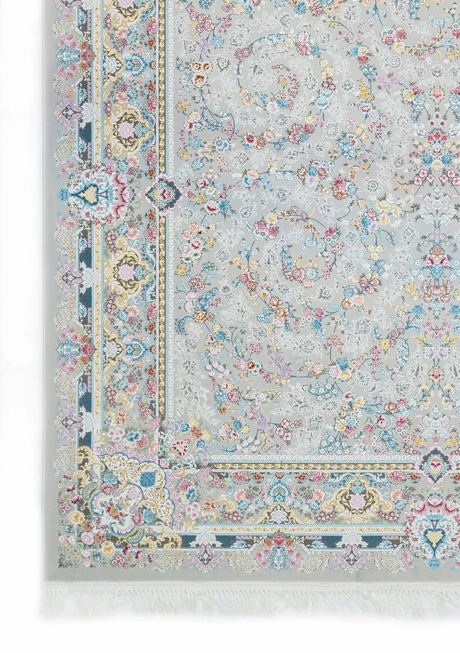 A Qaleen Carpets rug with a light grey background and a floral pattern in pastel colors, including pink, blue, and yellow,