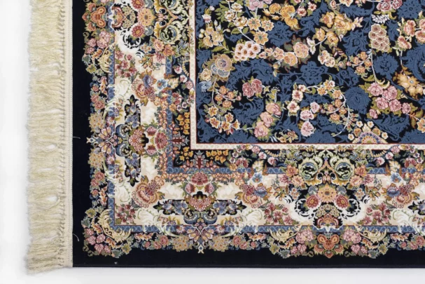 A close-up view of a Qaleen Carpets rug, showcasing its intricate design and rich colors