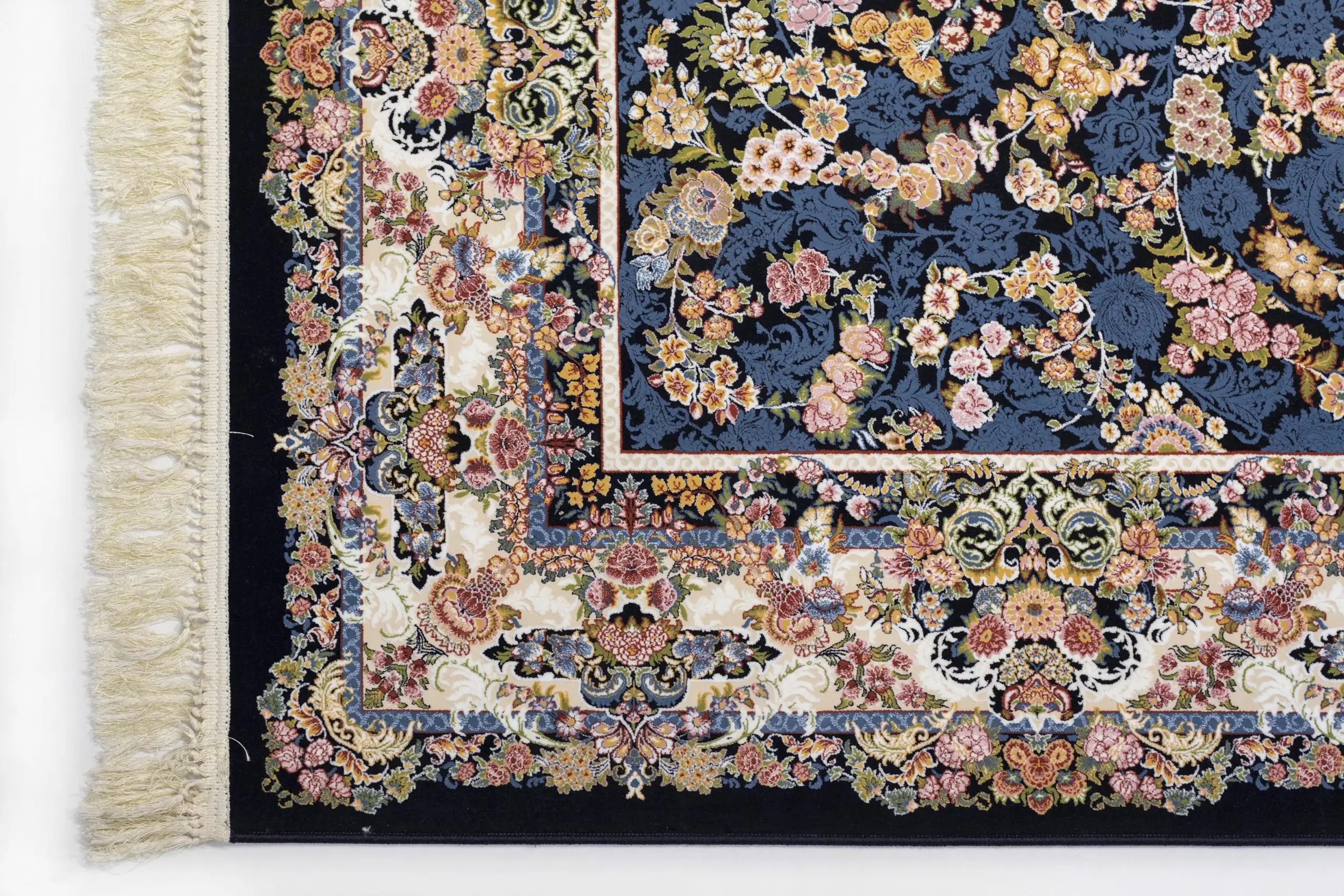 A close-up view of a Qaleen Carpets rug, showcasing its intricate design and rich colors