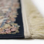 Carpets A close-up of a carpet's edge, with a focus on the intricate design and the soft, fluffy texture of the carpet's edge