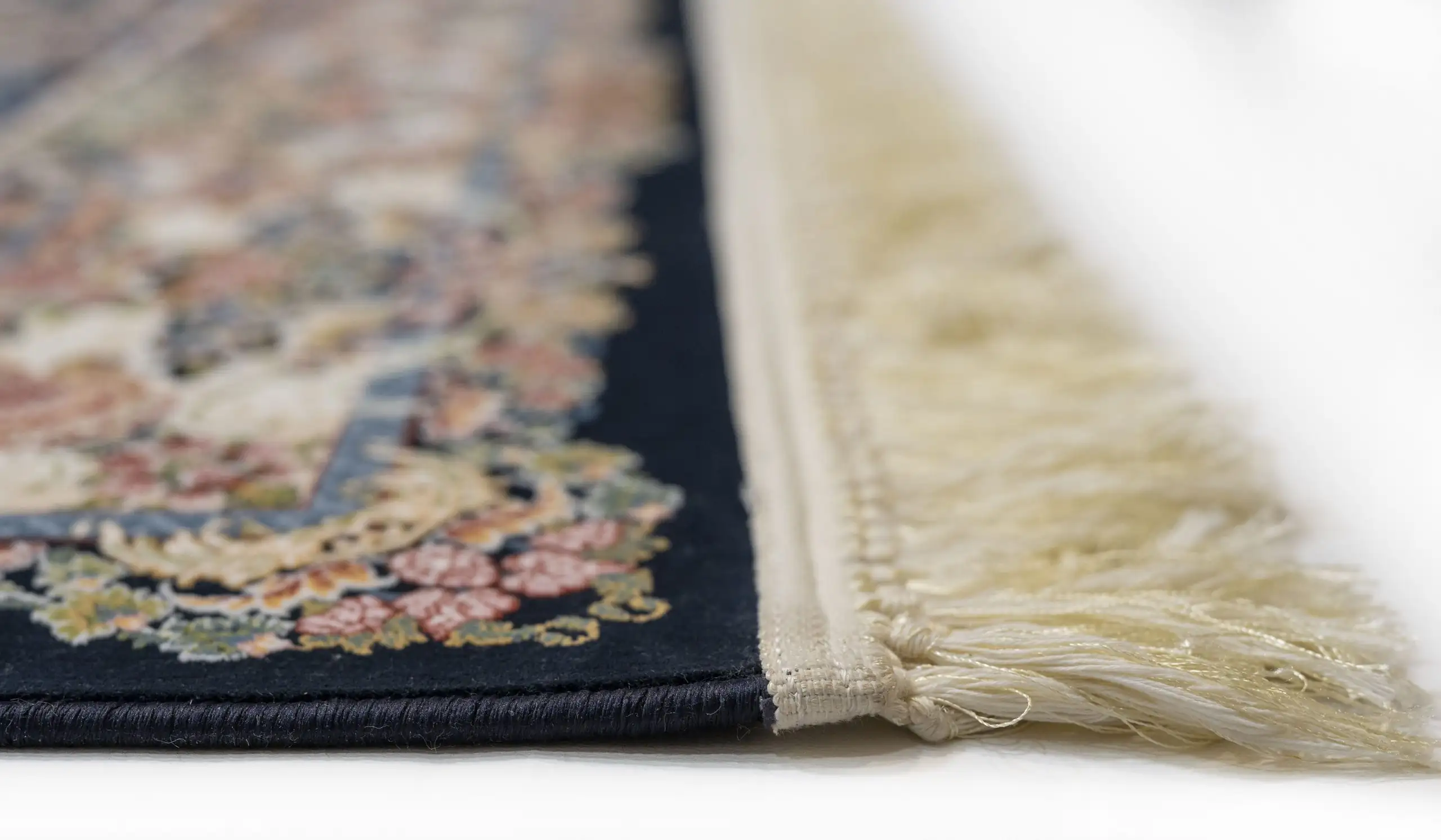 Carpets A close-up of a carpet's edge, with a focus on the intricate design and the soft, fluffy texture of the carpet's edge