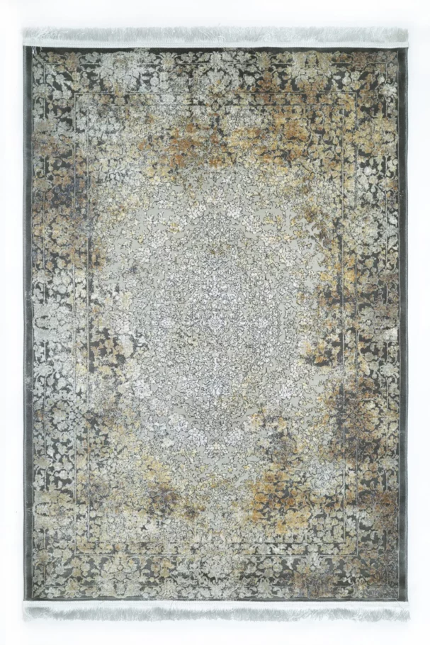 A Qaleen Carpets rug with a traditional, intricate design and a mix of earthy, muted colors