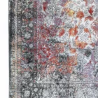 Carpets A beautiful, intricately designed carpet with a mix of red, purple, and gold hues, showcasing a classic, timeless