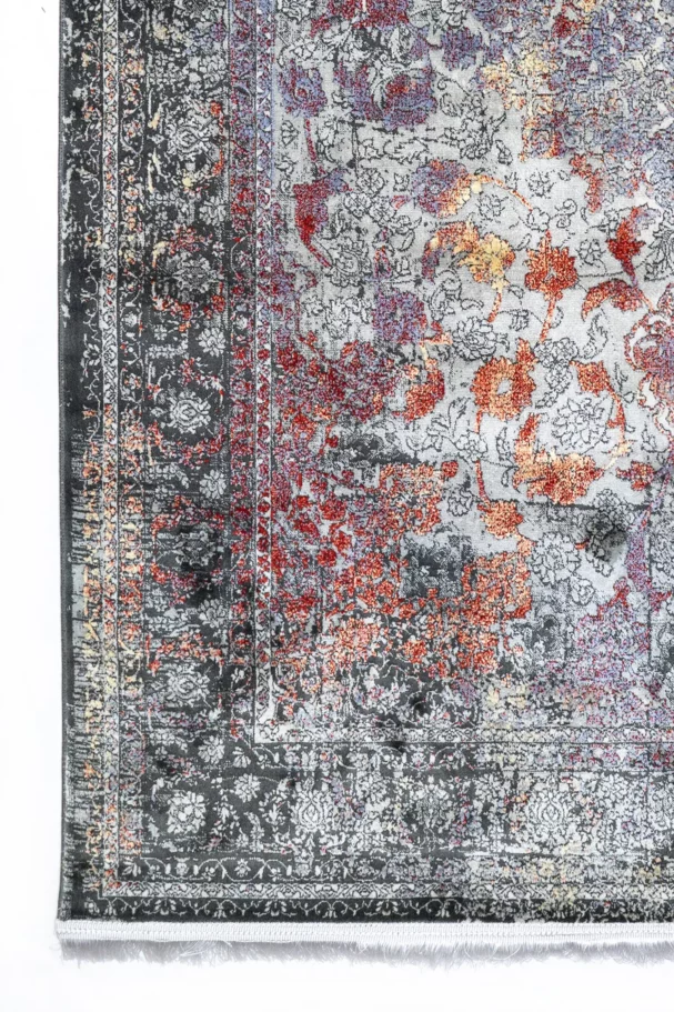 Carpets A beautiful, intricately designed carpet with a mix of red, purple, and gold hues, showcasing a classic, timeless