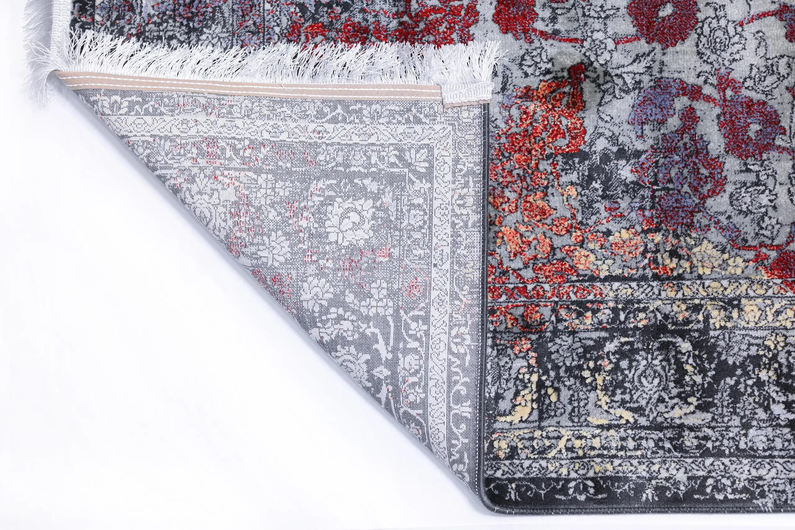 Carpets A carpet with a floral pattern and a subtle color scheme
