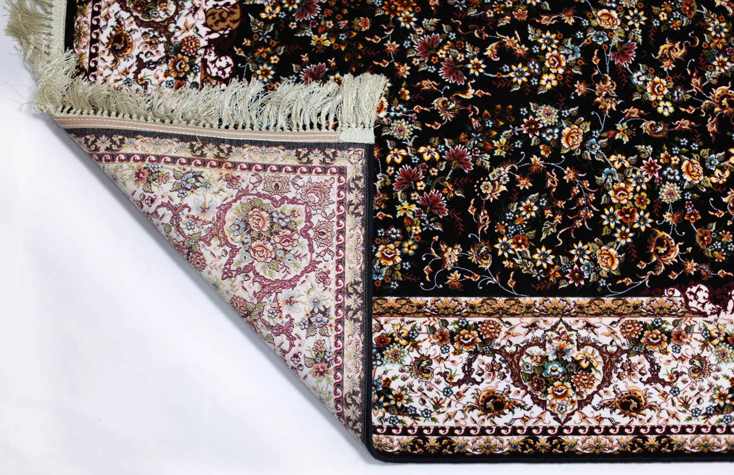 Carpets A carpet with a floral pattern and a fringe of white