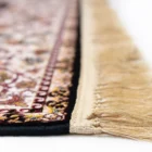 Carpets A close-up of a rug's edge with a fringe
