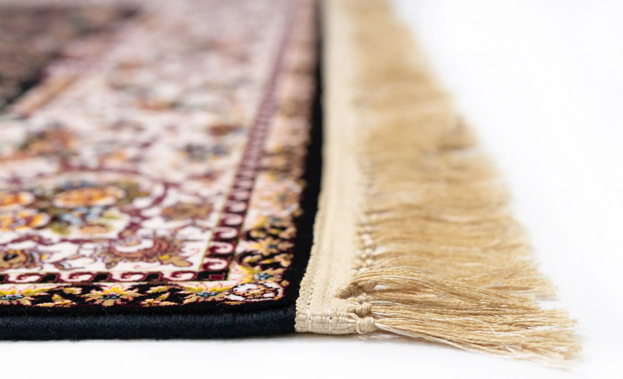 Carpets A close-up of a rug's edge with a fringe