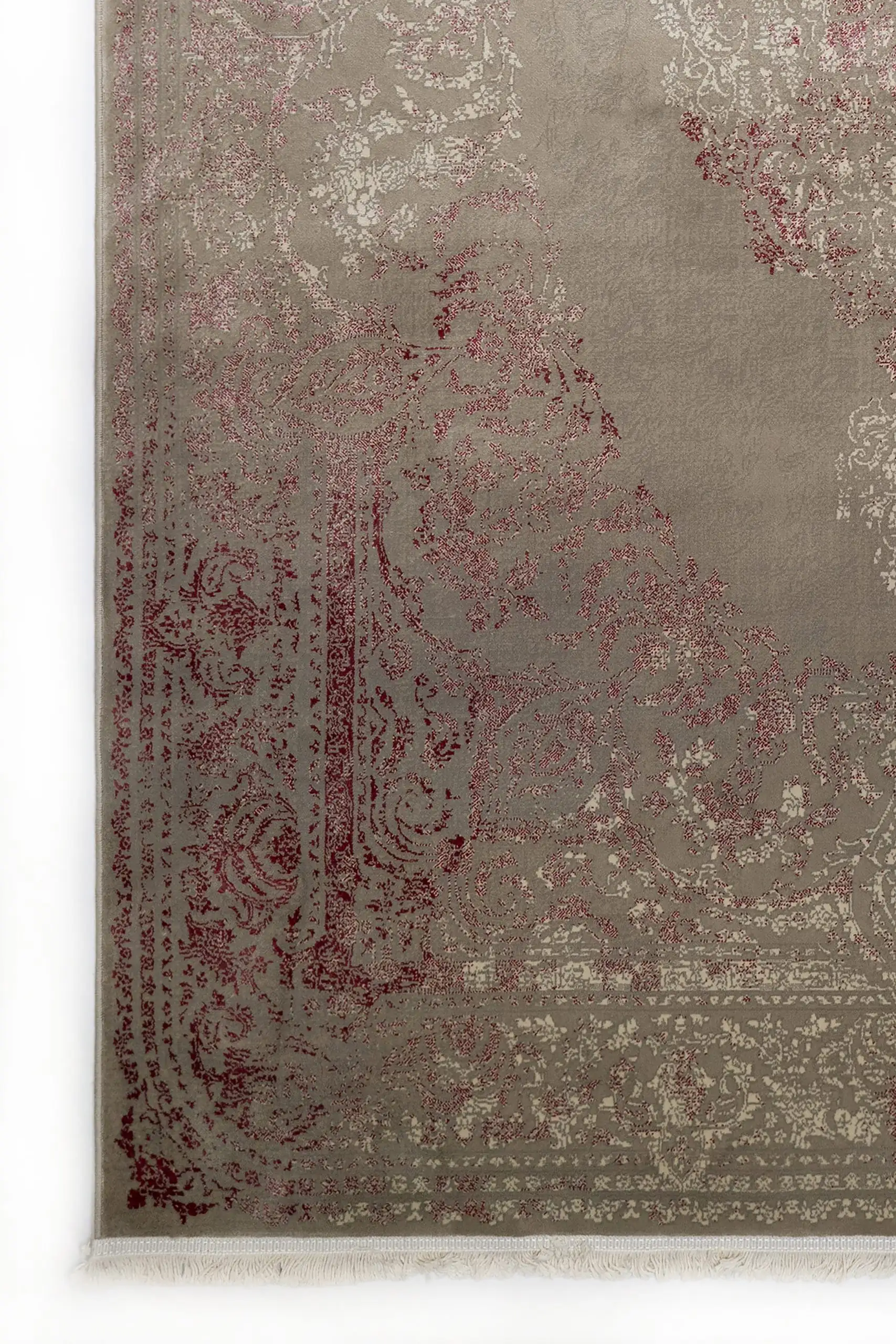 A beautiful, intricately designed carpet with a rich, vibrant pattern, perfect for adding a touch of elegance to any room,
