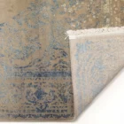 Carpets A beautiful, intricately designed carpet with a mix of blue and beige colors, featuring a classic, timeless pattern
