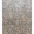 A beautiful, intricately designed carpet with a mix of traditional and modern elements, showcasing the art of carpeting and