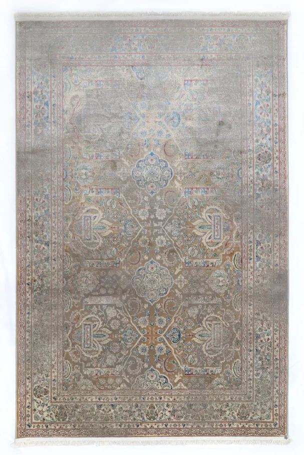 A beautiful, intricately designed carpet with a mix of traditional and modern elements, showcasing the art of carpeting and