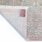 A high-quality image of a carpet with a rug-like design, featuring intricate patterns and a soft, plush texture, showcasing