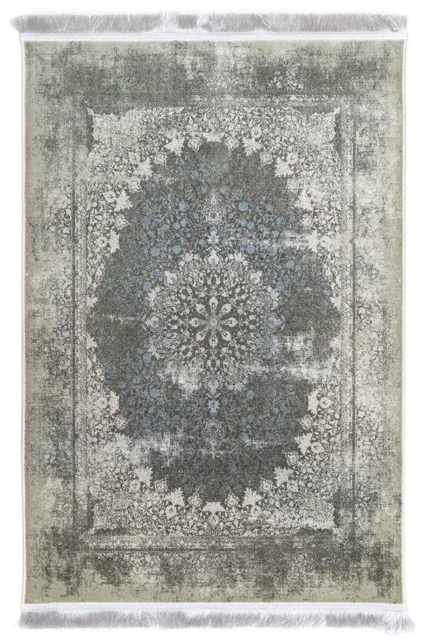 Carpets A rug with a distressed, vintage-inspired design, featuring a central floral pattern in a mix of blue and white,
