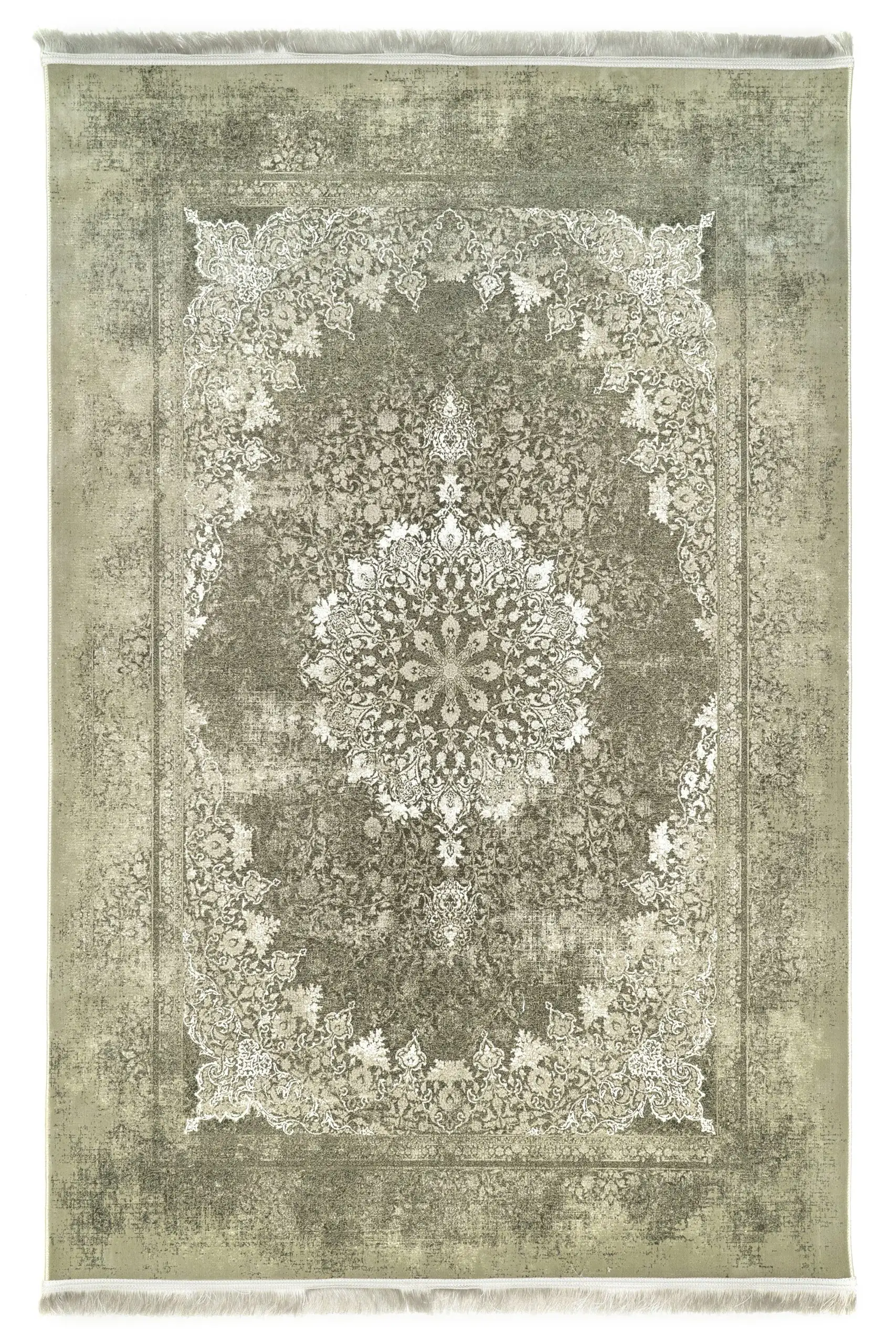 A Qaleen Carpets rug with a distressed, vintage-inspired design in muted green and cream tones, featuring a central